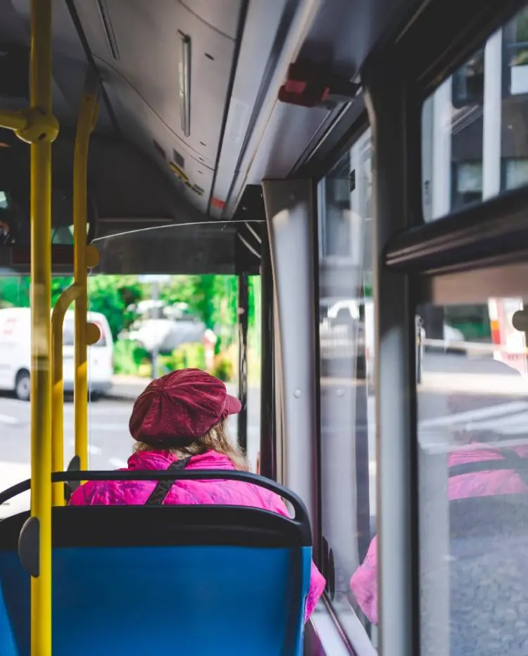Woman sitting in bus