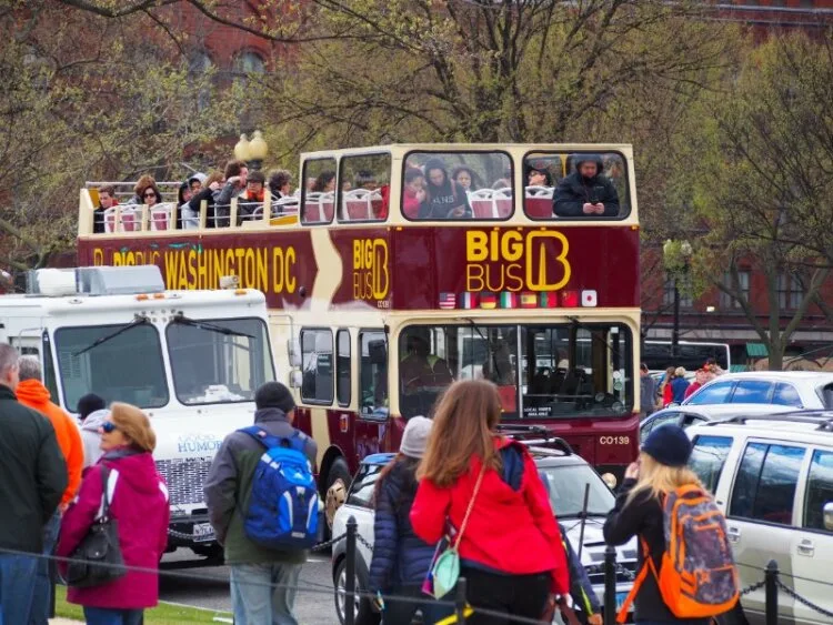 The Big Bus on a street giving a tour