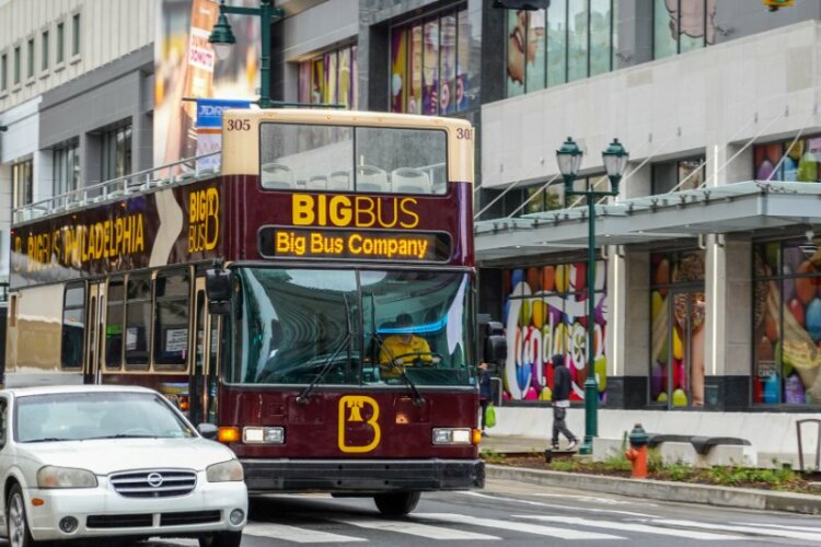 An empty double decker hop on hop off tour big bus was seen on a street 