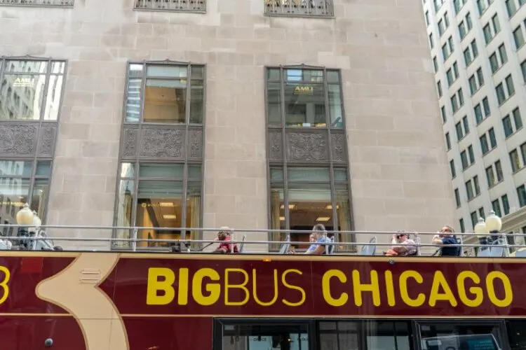 Tourists ride the Chicago Big Bus