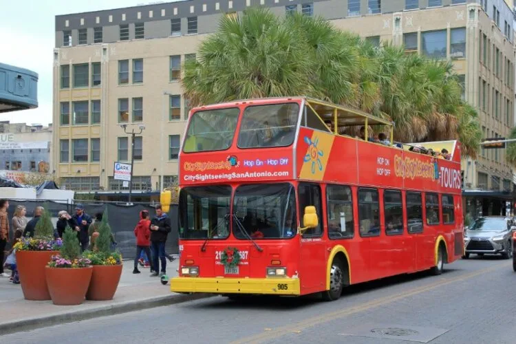 Bus parked on Street allowing tourists to board