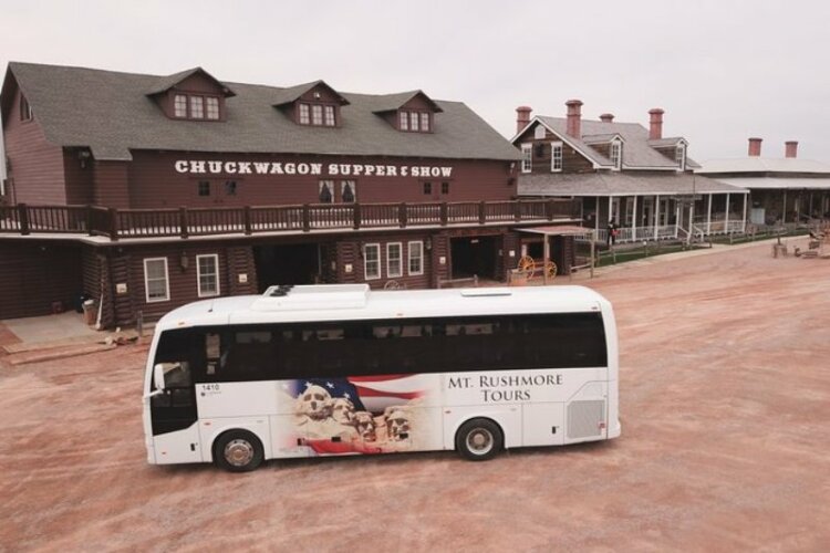 Bus parked outside Chuckwagon supper and show