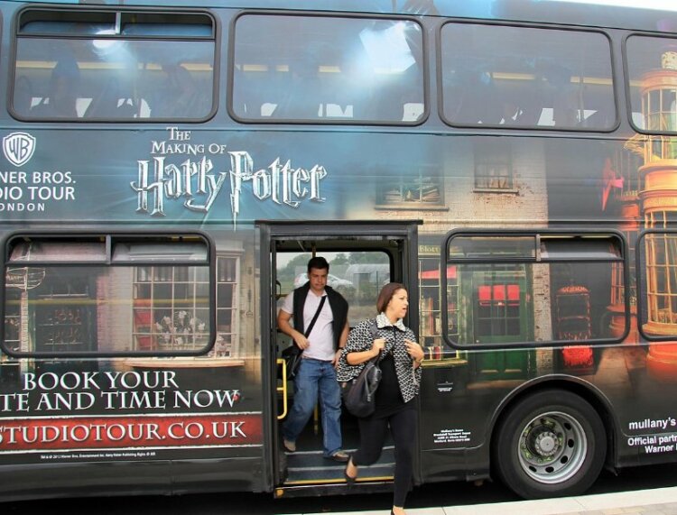 Tourist Getting out of the Harry Potter Tour Bus