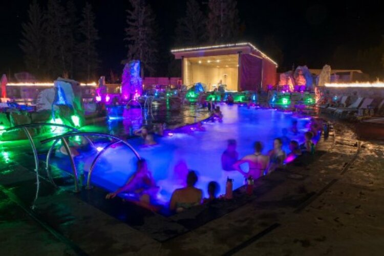 People in the swimming pool enjoying hot spring