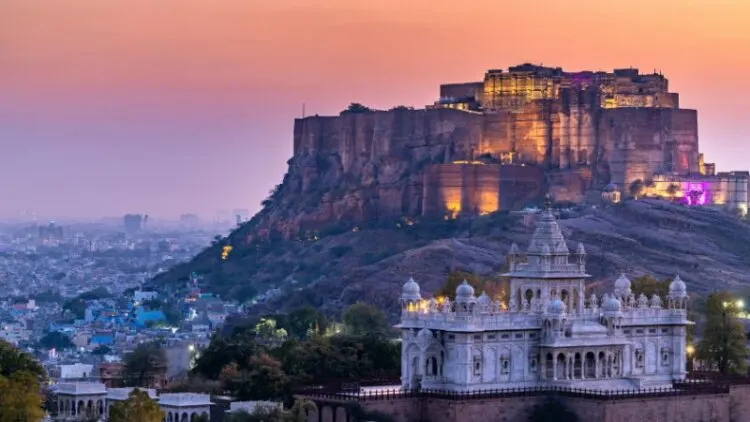 View of The Jaswant Thada and Mehrangarh Fort in background at sunset