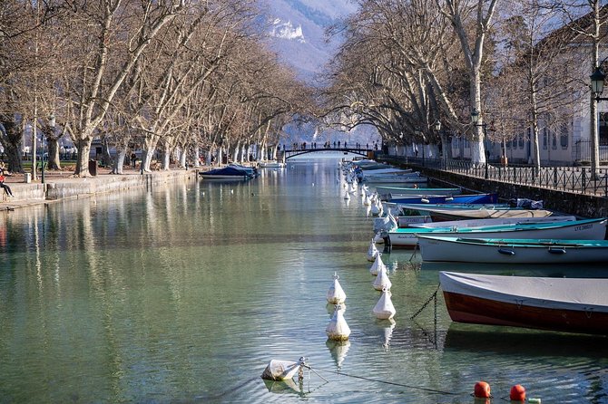 A beautiful view of Lac d’Annecy with parked boats