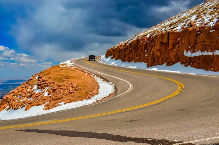 The road to the snow-covered mountain Pikes Peak