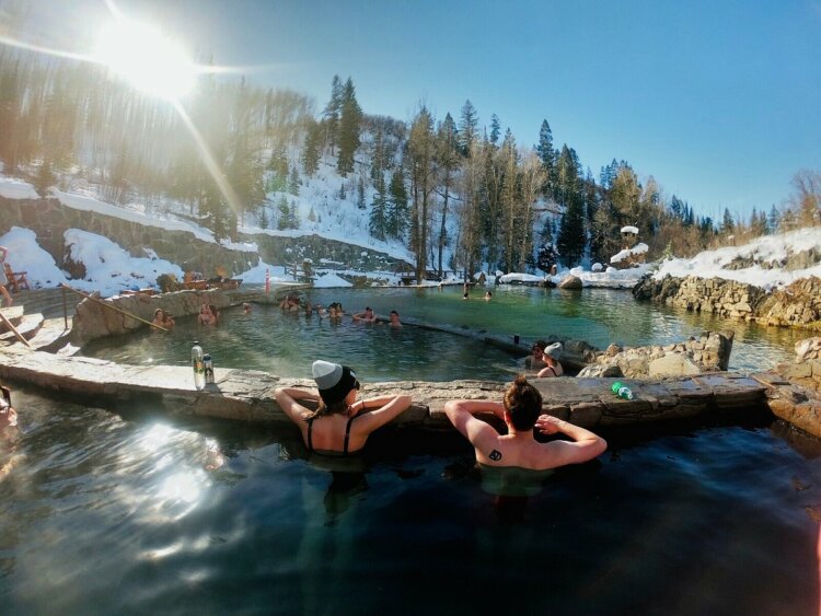 people taking a dip at the Steamboat Hot Springs