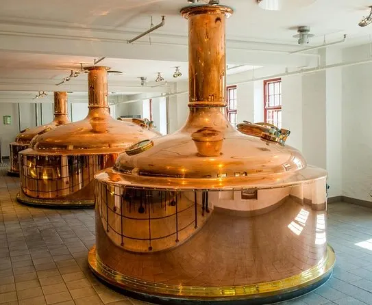 Golden distillery machines at Carlsberg Brewery in Copanhagen