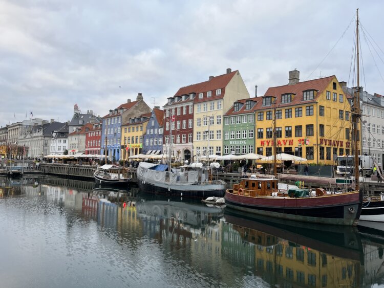 Colored houses align the Nyhavn street in Copenhagen