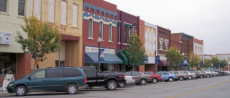 Buildings and parked cars in Commercial Street in downtown Atchison, Kansas