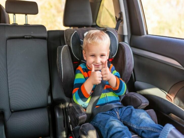 Boy sitting on a car seat