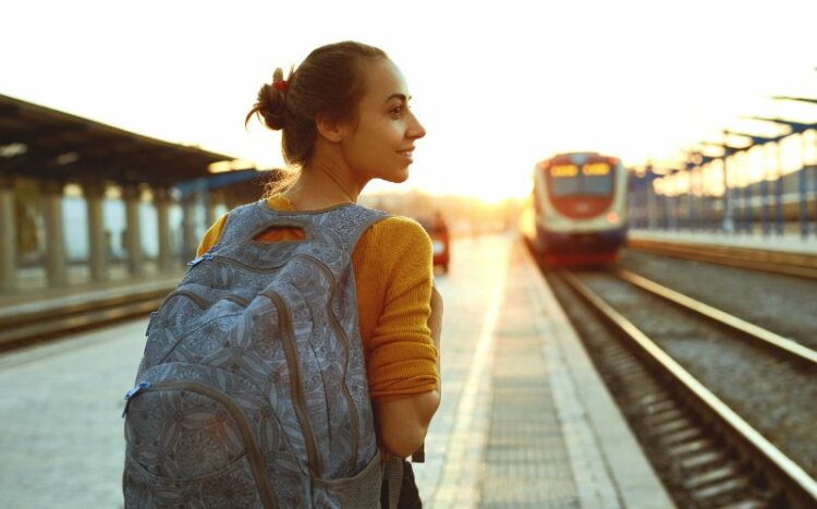 Young woman traveler with backpack