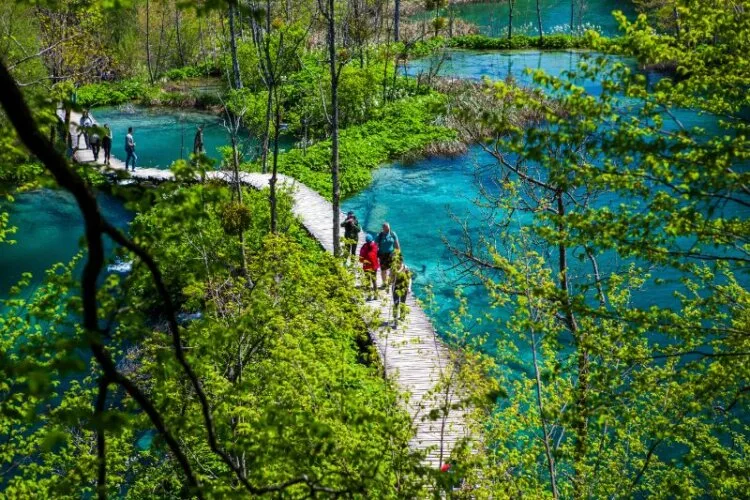 Tourists exploring in Plitvice Lakes National Park