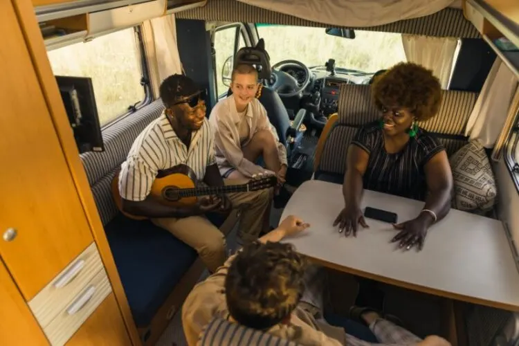 Friends playing inside a bus