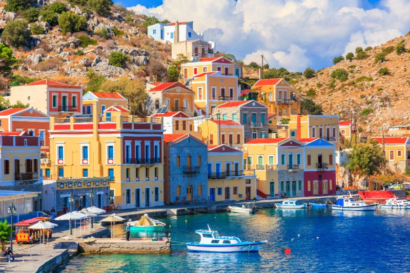 Dodecanese Islands with colorful houses and buildings at the coast
