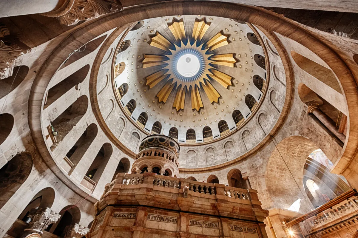 The interior of the Church of the Holy Sepulchre in the Old City of Jerusalem is illuminated by the light from the dome overhead