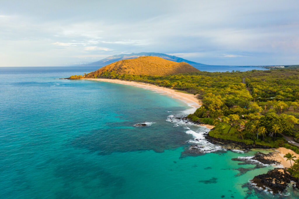 Stunning Makena Beach view in Maui, showcasing turquoise waters and lush tropical landscapes.