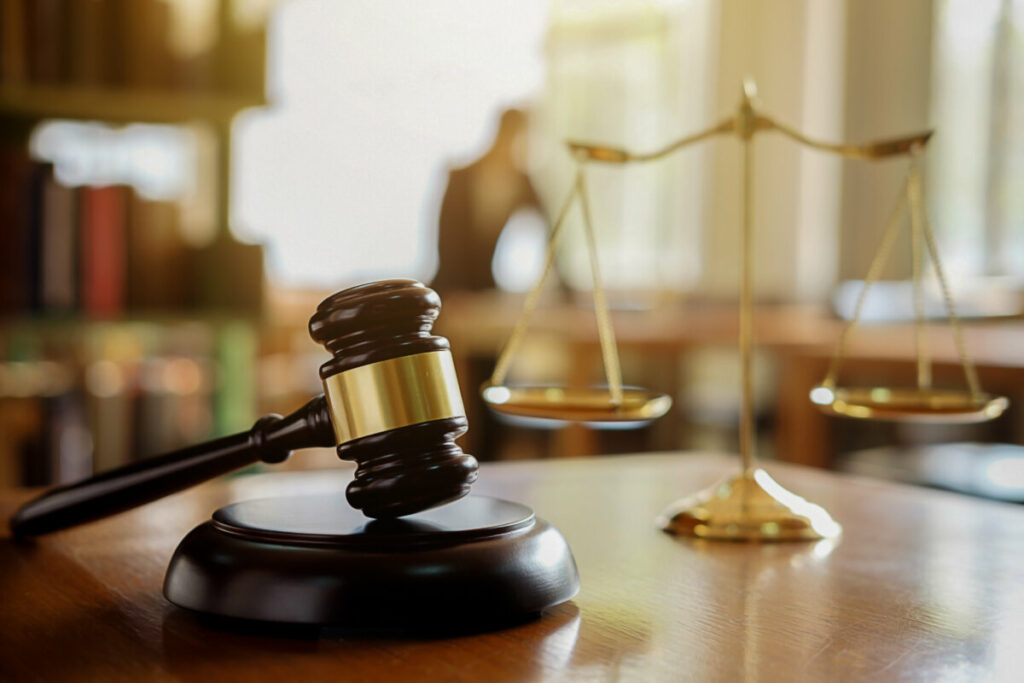 Close-up of Judge gavel with Justice Scales