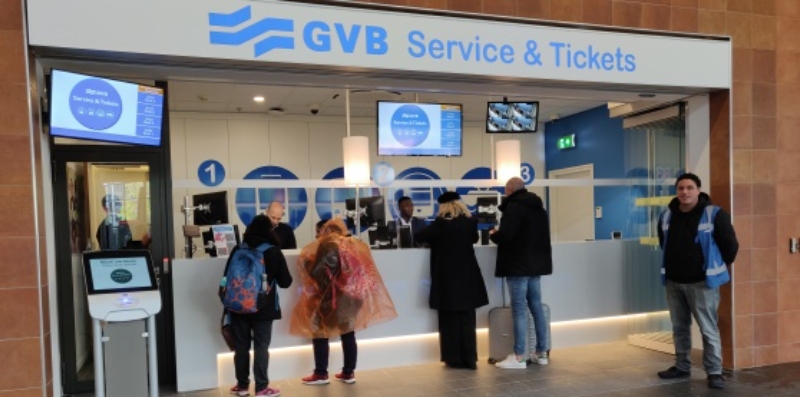 GVB Service & Tickets center featuring modern design, customer interactions, and self-service kiosk.