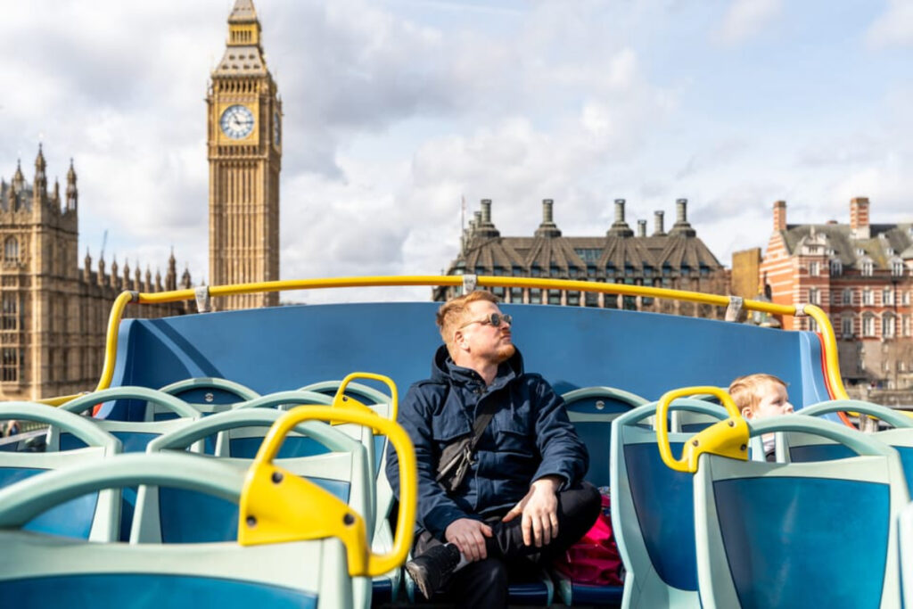 Tourists enjoying the Tootbus seats, quality, and comforts