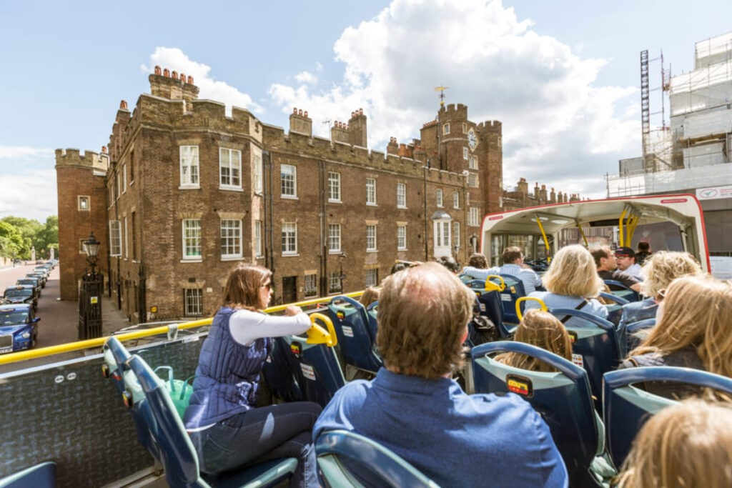 Tootbus Must-See Hop-On Hop-Off Bus with tourists enjoying a sightseeing tour in London, England