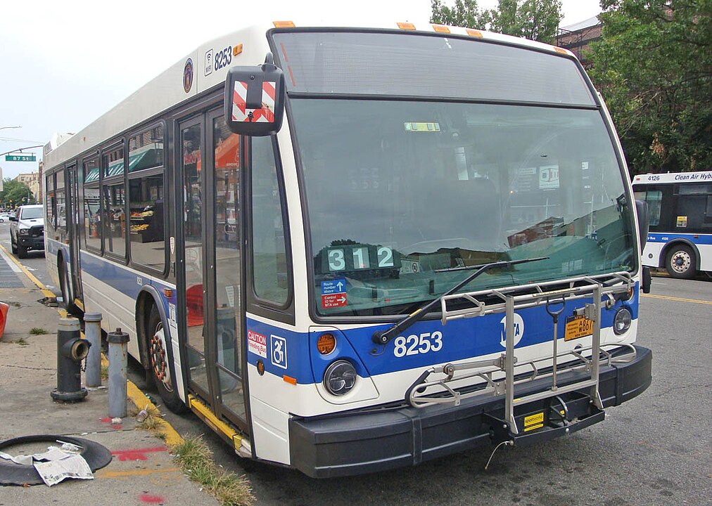 Close up of a MTA New York City Bus with a bike rack