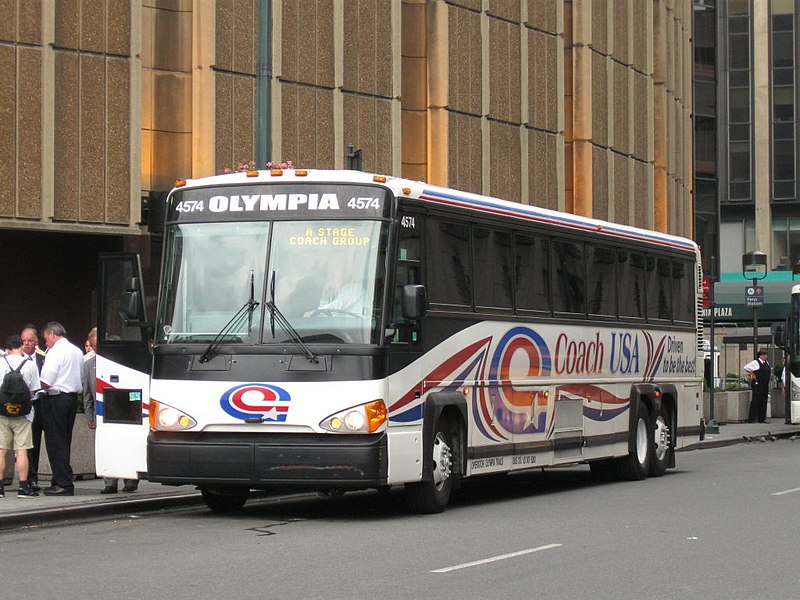 Olympia Trails Bus park on a street in New York
