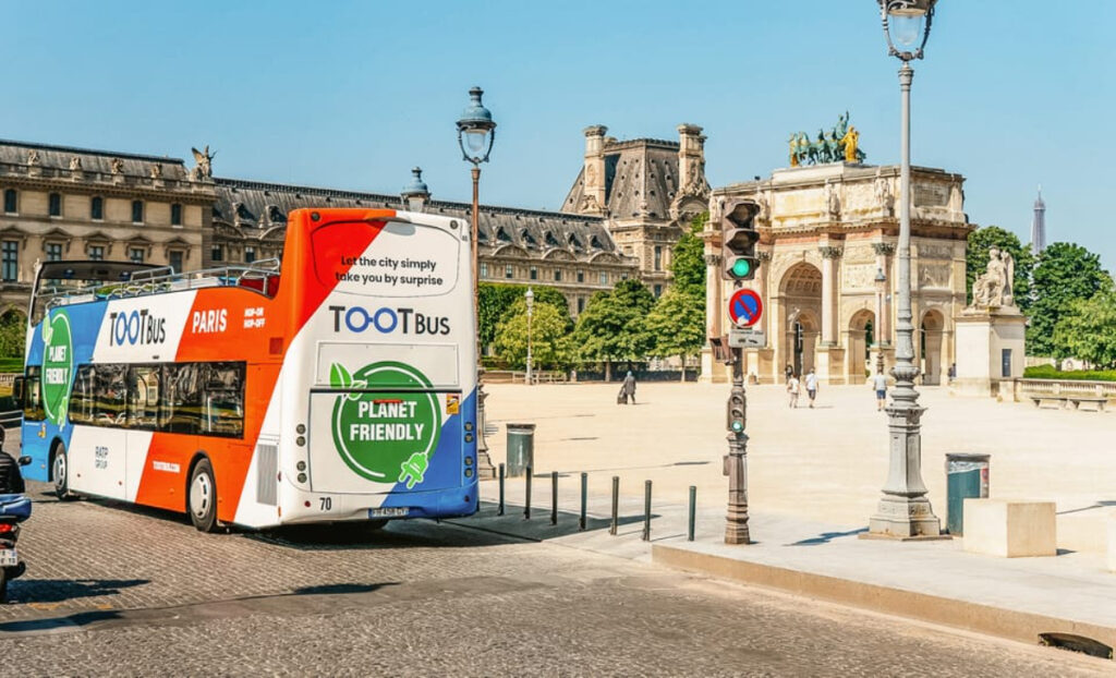 Paris Tootbus Bus parked on a historical attraction in Paris, France