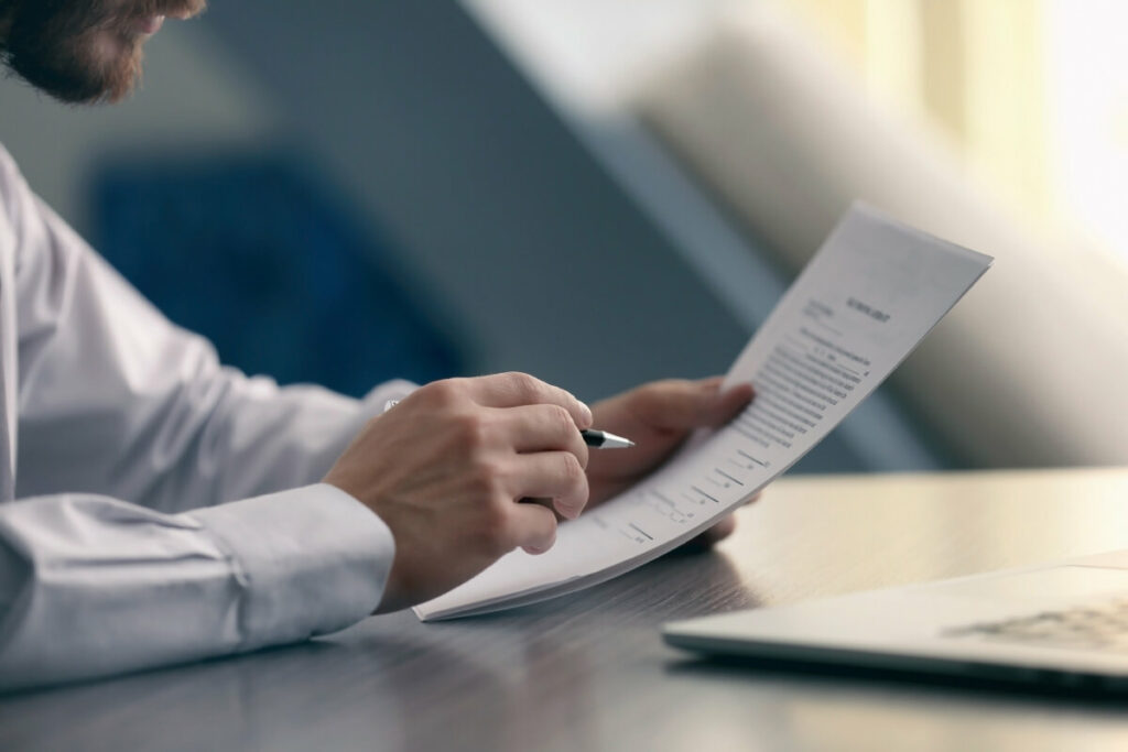 Man attentively reading a document